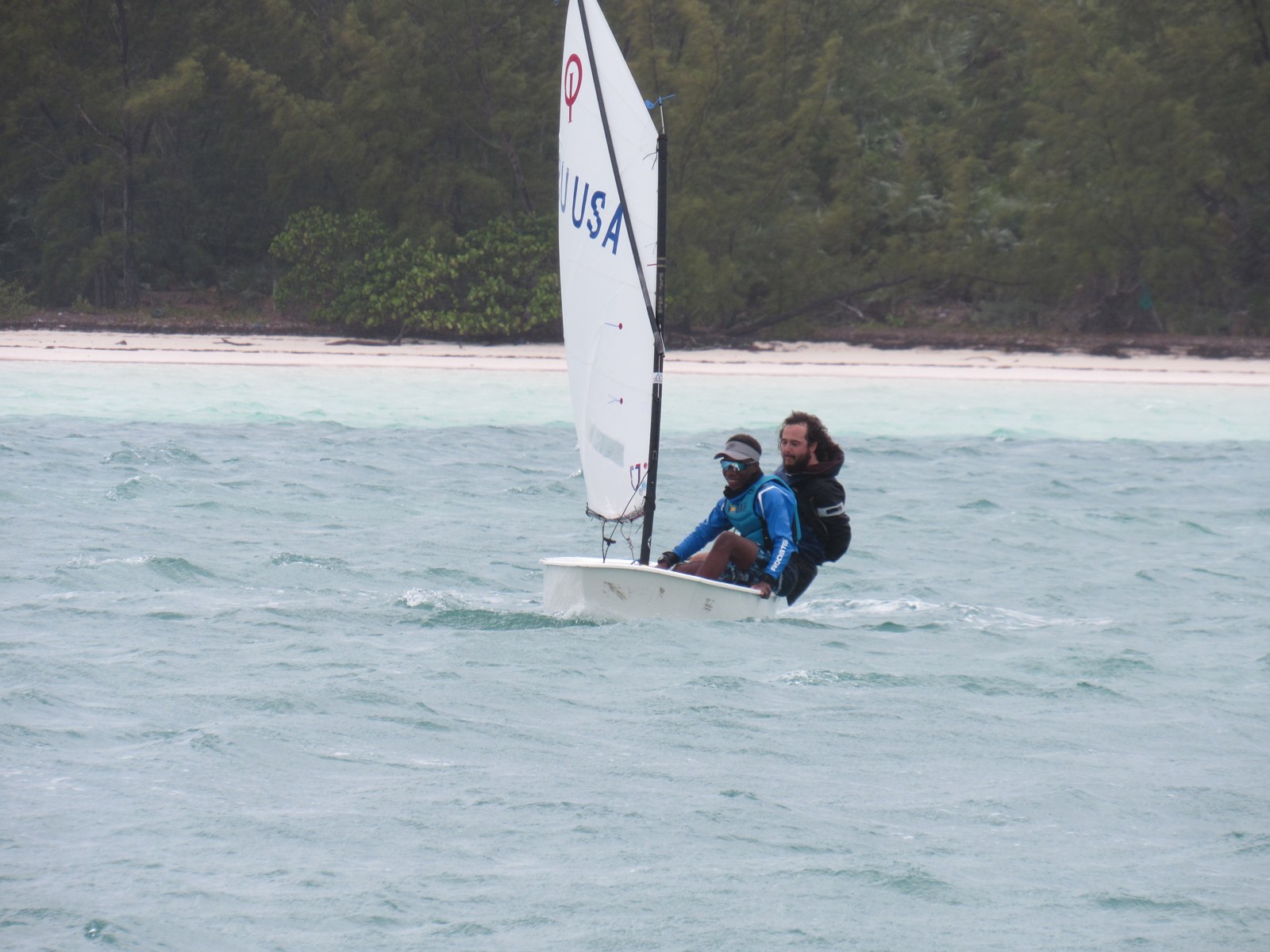 On-water coaching in an Optimist dinghy